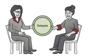 Delegator_TwoWomenPassingDelegationCircle